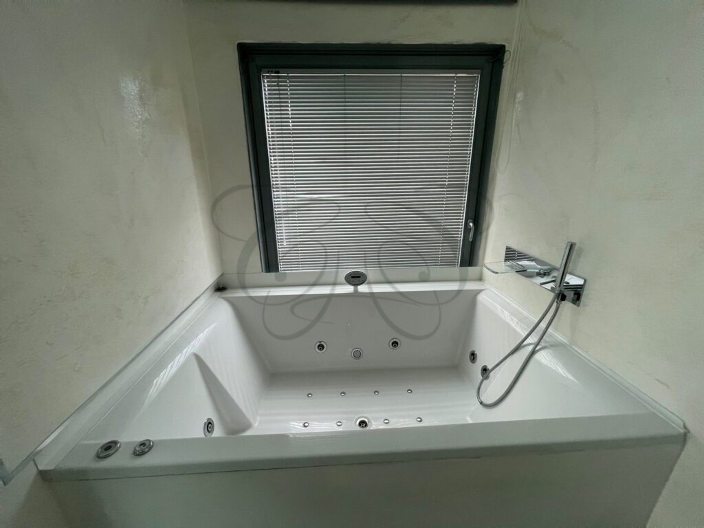 A modern smart home with integrated technology for sale in Casal Palocco, Rome.