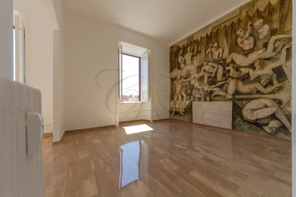 Sala da pranzo con affresco storico in appartamento di lusso affittato da Class & Country Homes a Roma, quartiere Pinciano.