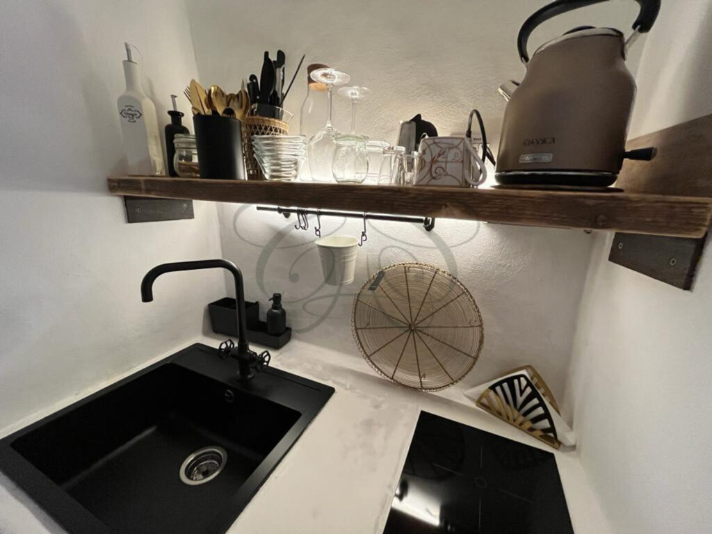 A precious "jewel box" dammuso home for sale in Noto by Class & Country Homes.