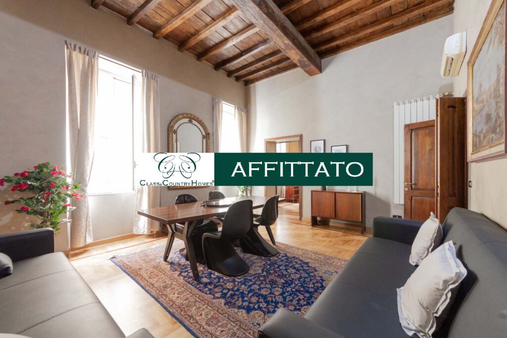 il living di lusso arredato di questo appartamento affittato da Class & Country Homes