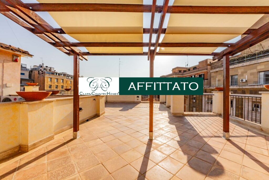Vista panoramica su Roma dalla terrazza di un attico affittato da Class & Country Homes.