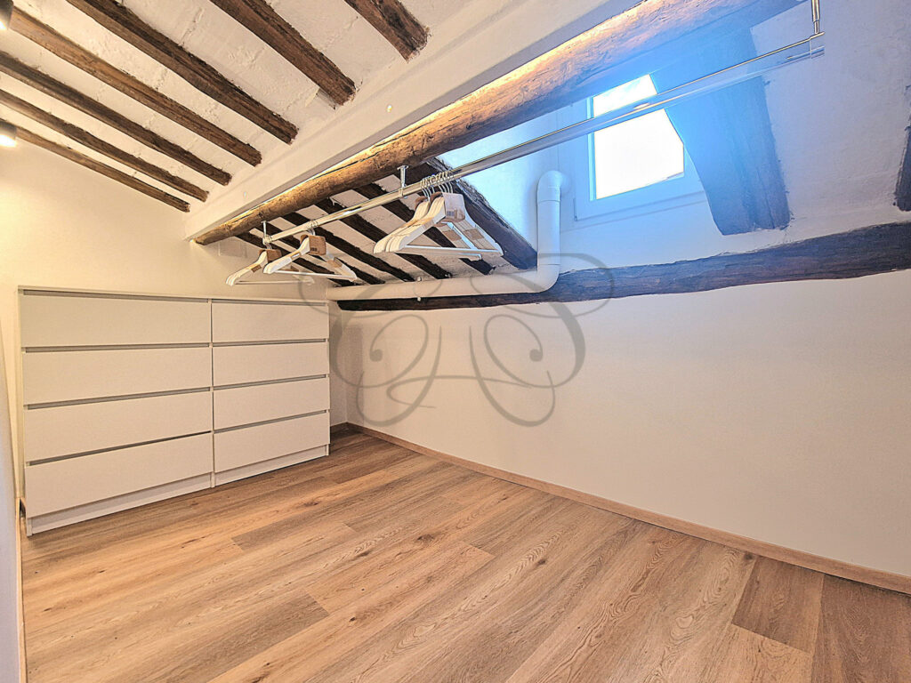 The bespoke dressing area in the attic apartment for rent near Piazza Navona.