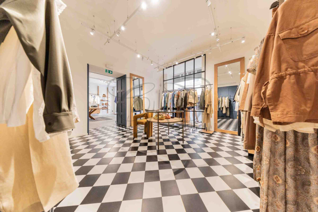 The interior of a high-end commercial property, representing a secure income-producing investment in central Rome.