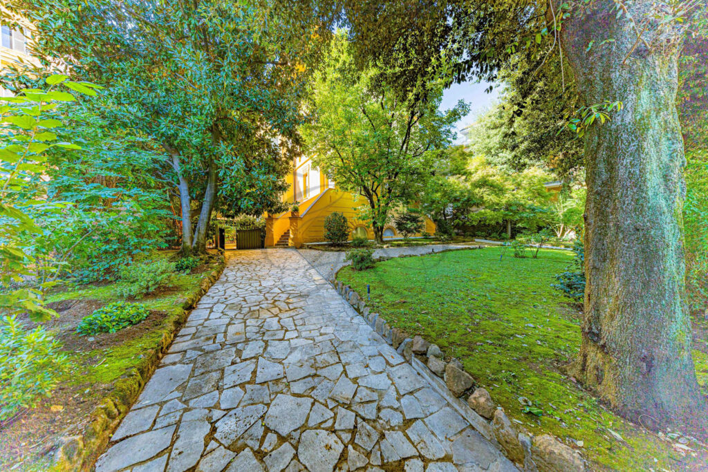 Stone walkway in the mature private garden - Class & Country Homes.