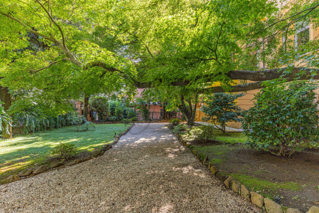 Mature trees providing shade in the extensive private garden - Class & Country Homes.