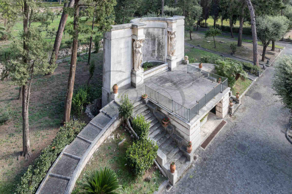 The large stone fountain in the villa's Italian garden - Class & Country Homes.