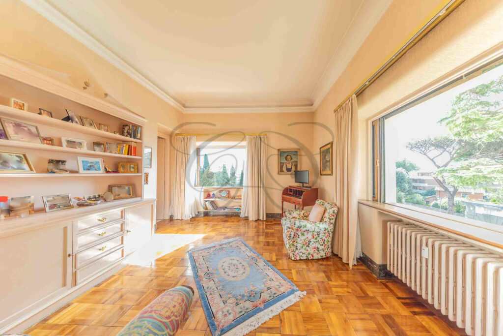 Master bedroom with parquet floors in Vigna Clara apartment - Class & Country Homes