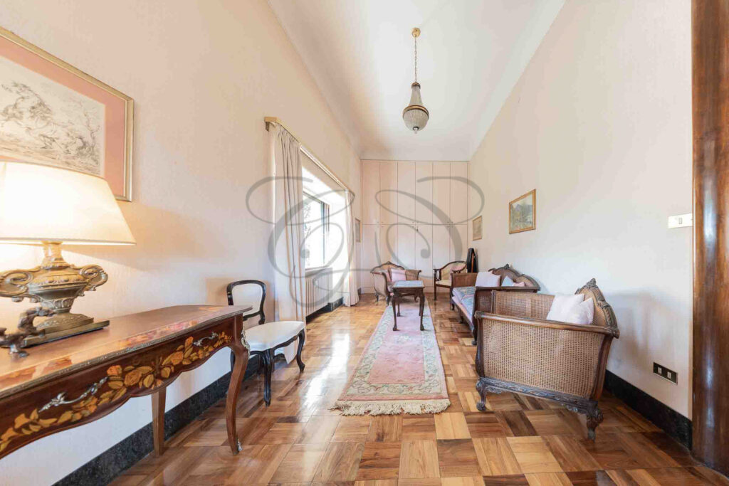 A formal study room with antique desks and parquet floor - Class & Country Homes.