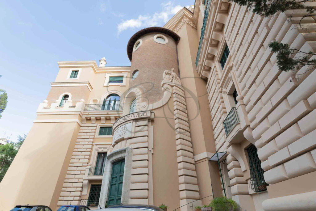 Architectural detail of the historic villa's stone tower - Class & Country Homes.