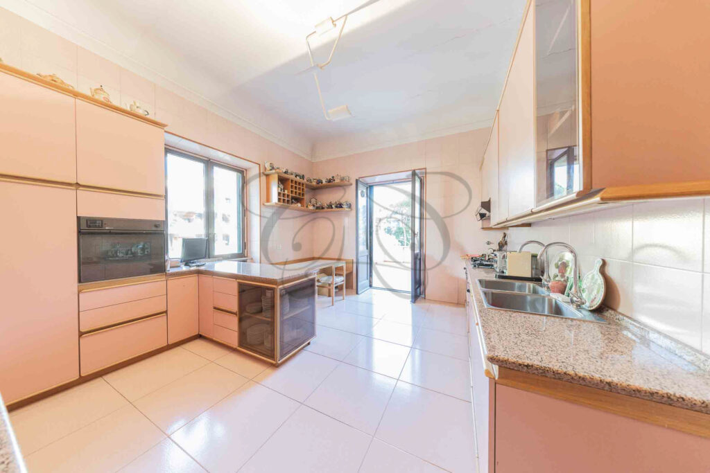 A view of the spacious, functional kitchen, characterized by modern cabinetry