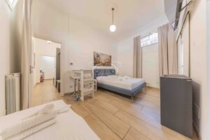 Prati Rome apartment for sale investment — main room towards the hallway