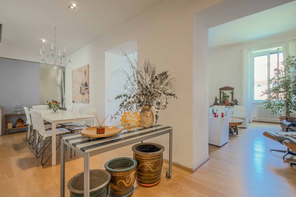 Prati Rome luxury apartment for sale — dining area leading into the living room