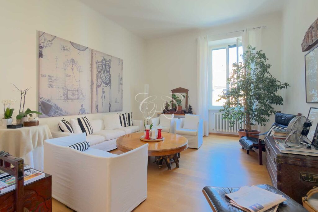 Prati Rome luxury apartment for sale — living room with tall windows