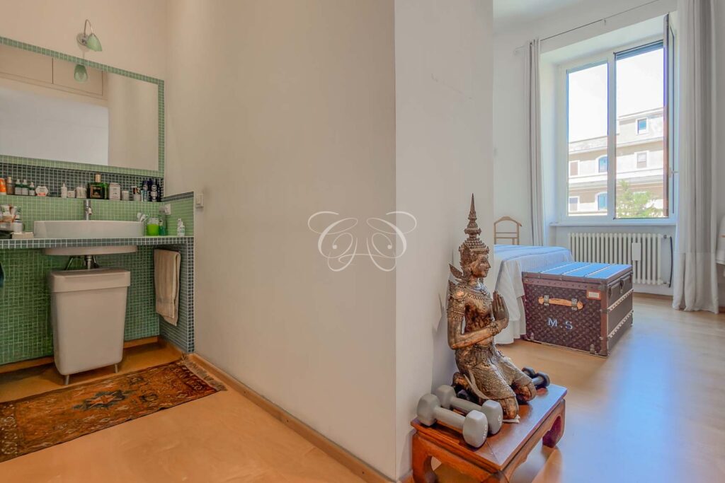 Prati Rome luxury apartment for sale — master bedroom with en suite bathroom