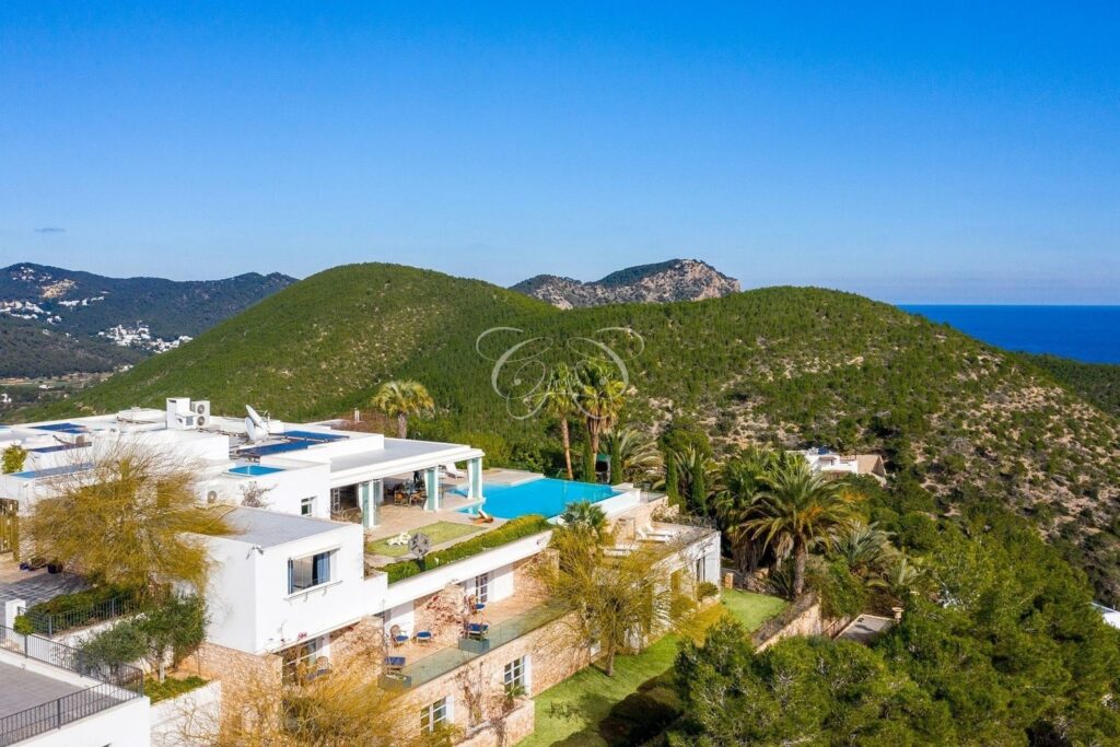 Roca Llisa Ibiza luxury villa for sale — aerial view towards the sea